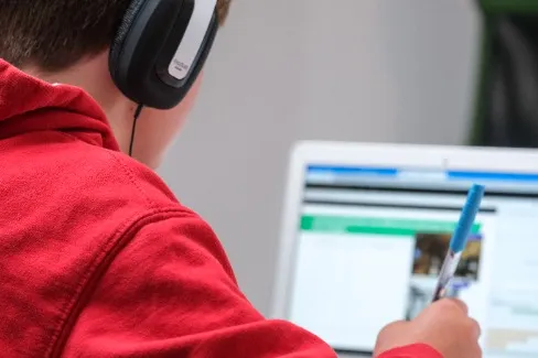 A student working on a laptop